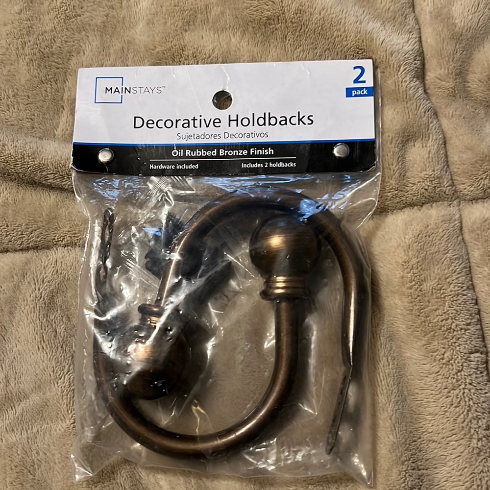 Decorative hold backs for curtains